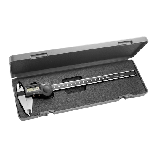 Facom 1320 digital caliper in black plastic storage case, shown from top angle on white background.
