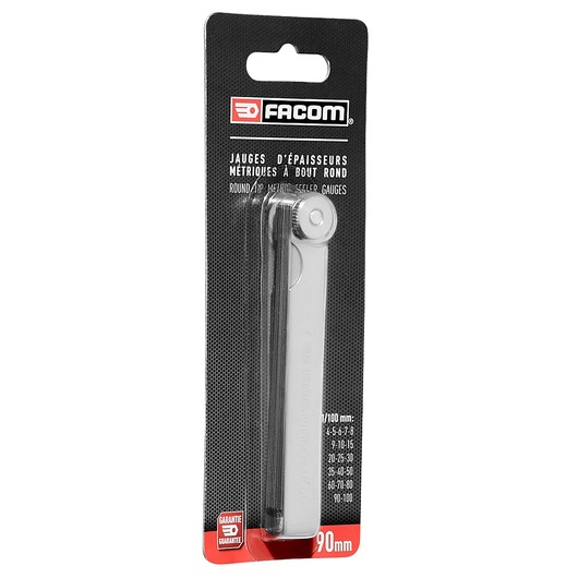 Facom 1618_00PB round tip metric steel gauge set in silver, packaged on black card, front angle view.