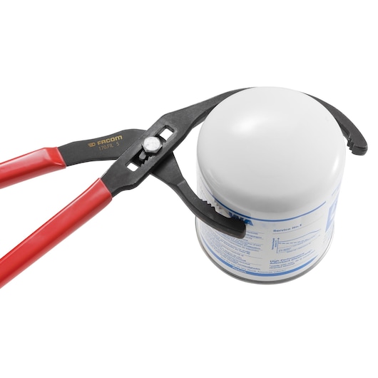 Facom 170.FILPB oil filter pliers with red handles gripping a white oil filter, front angle on white background.