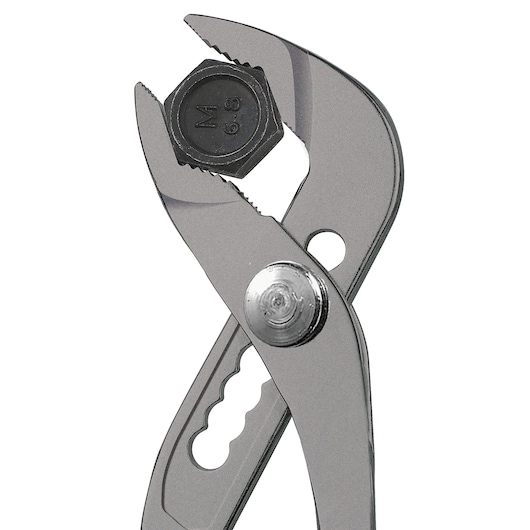 Facom 170APB adjustable pliers holding a hex bolt, close-up on white background.