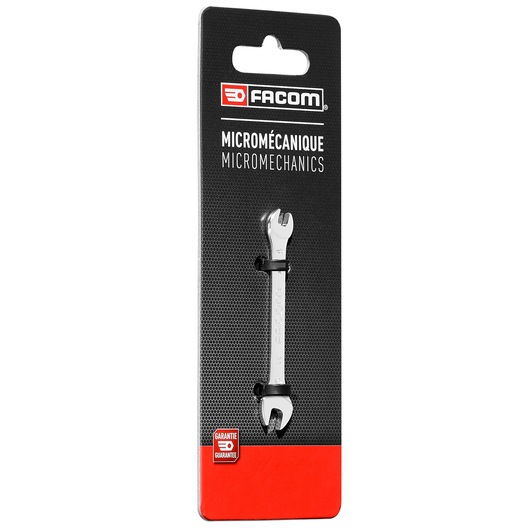 Photo of Facom 22_3_2X5_5 micromechanics open-end wrench on retail packaging, angled view, black and red card.