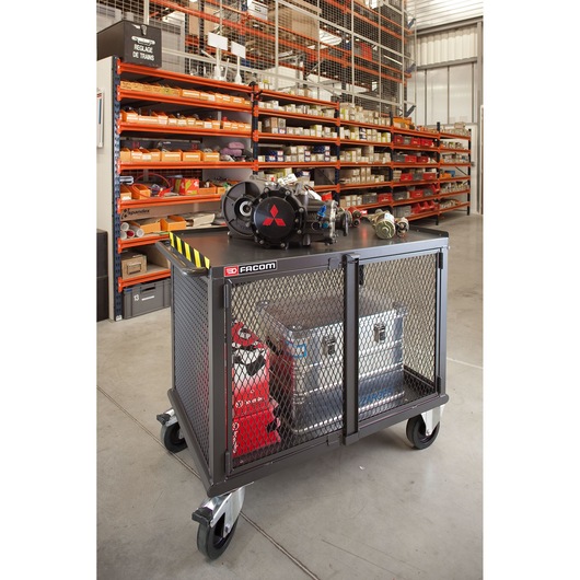 Facom 2703 industrial rolling storage cart with mesh sides, tools and parts, front angle photo in workshop.