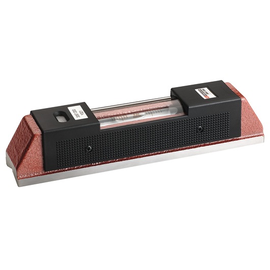Facom 3067200 precision cast iron spirit level, red textured body, black plastic ends, angled side view.
