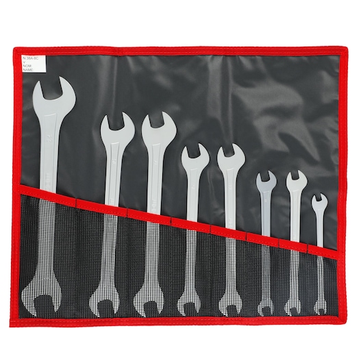 Facom 31_JE8T wrench set in black and red pouch, flat lay photography, tools organized by size.
