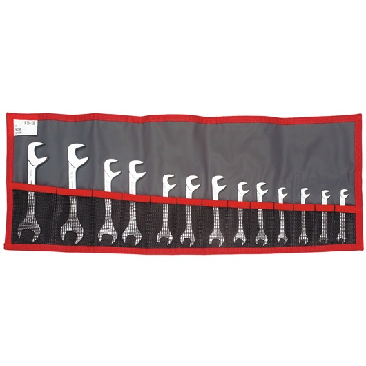 Facom 34_JU13T set of open-end wrenches in a red and black tool roll, photo on white background.