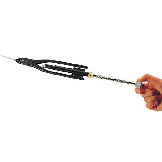 Facom 445_8R wire twisting pliers tool held in hand, side angle on white background.