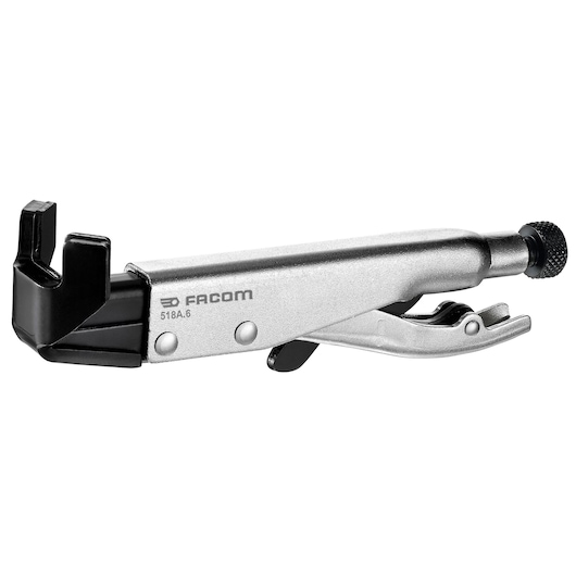 Photo of Facom 518A6 locking welding clamp with silver body and black jaws, side view on white background.