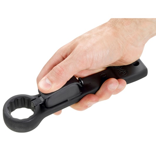 Photo of Facom ratcheting box wrench SKU 51BS_30 held in a hand, black finish, close-up view.