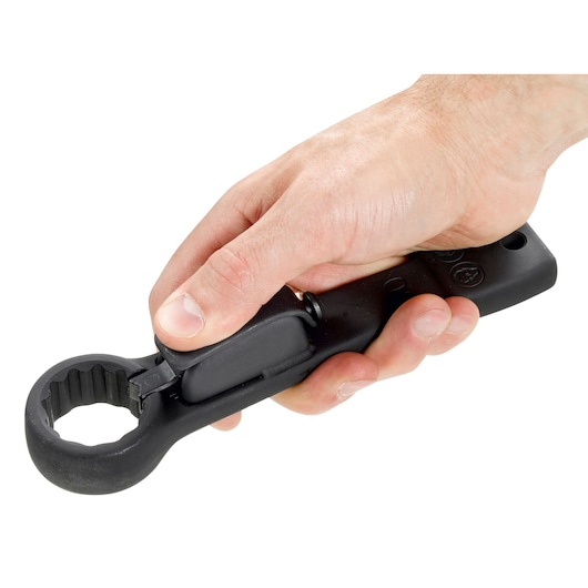 Photo of a hand holding a Facom ratcheting offset wrench, SKU 51BS41, close-up on white background.