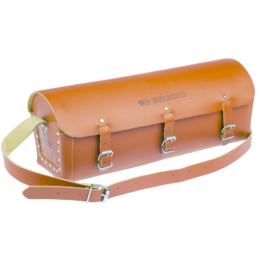 Facom 703232 leather tool bag with three buckles and shoulder strap, front angle on white background.