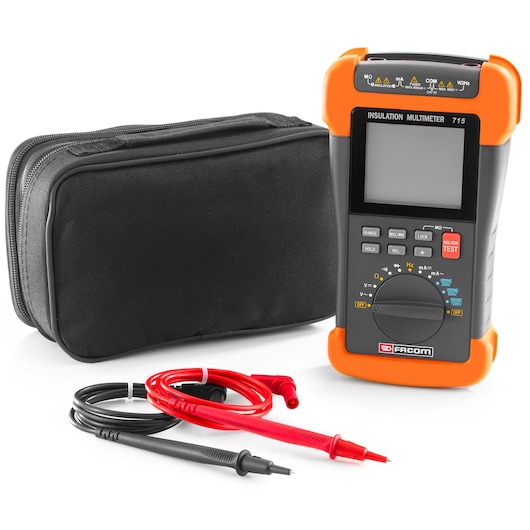 Facom insulation multimeter model 715 with an orange protective cover, displayed alongside a black carrying case and a pair of red and black measurement probes.