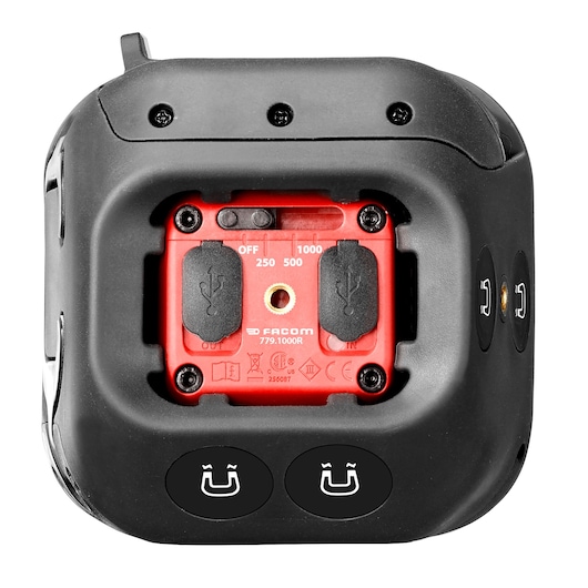 Photo of Facom 779.1000RPB black and red electronic tool base with USB ports, settings dial, and magnetic symbols, top angle.