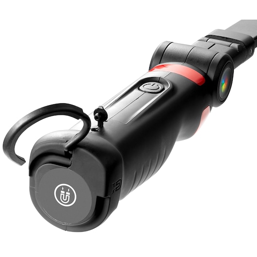 Facom 779CML compact black work light with hook, on switch, close-up angle, white background.