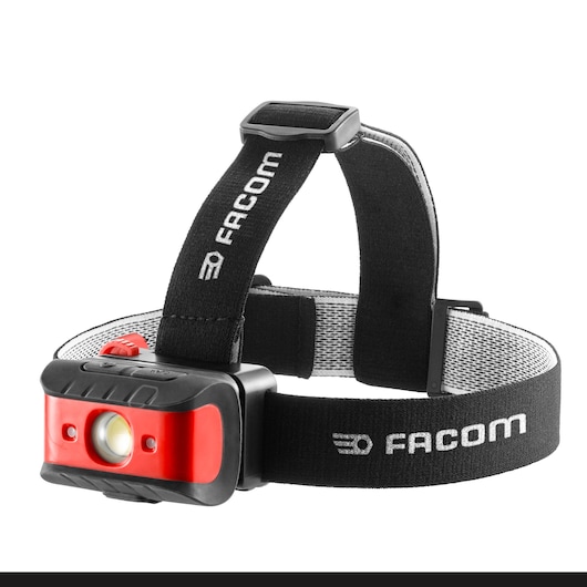 Facom 779_FRT3PB headlamp with adjustable black strap and red front panel, side angle on white background.