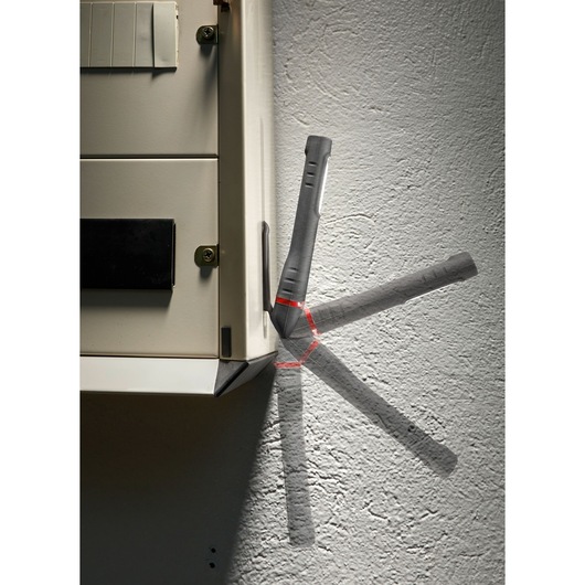 Photo of Facom 779_PEN2PB inspection light shown in various pivoting positions against a light wall and cabinet.