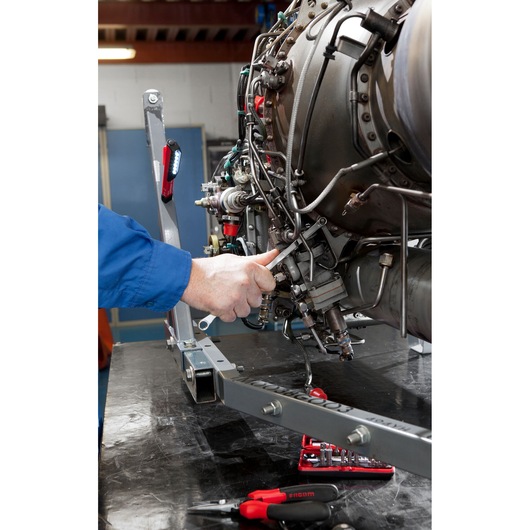 Facom 779.PENPB tools and set used for engine maintenance, close-up photo on workbench.