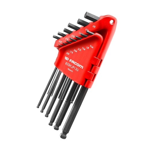 Facom 83SHJP13U hex key set with 13 black ball-end keys in a red plastic holder, angled view on white background.