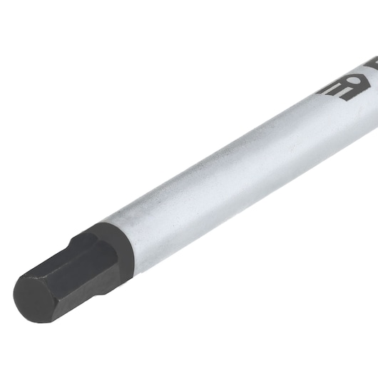 Facom 84TC_6 hex key with silver shaft and black hex tip, close-up on white background.