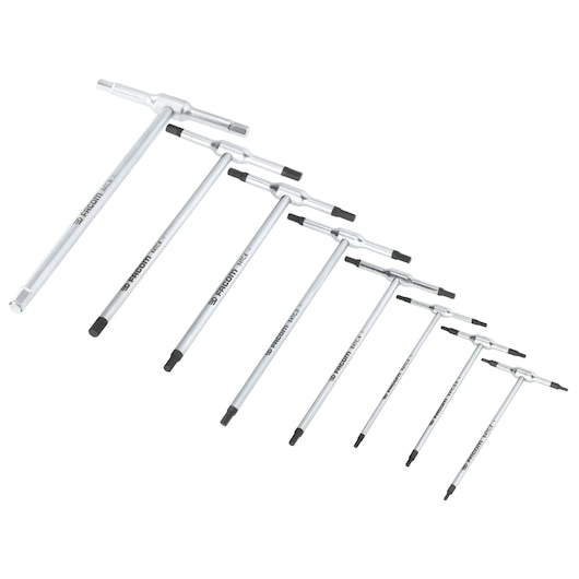 Photo of Facom 84TCJ8PB T-handle hex key set, eight silver wrenches with black tips, side angle on white background.