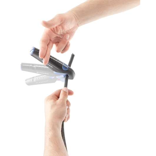 Facom 872271 cable stripping tool in use, cutting insulation from a black electrical cable, white background.