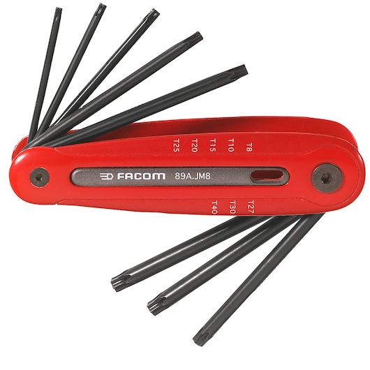 Facom 89R_JM8 red folding Torx key set with eight black star-shaped keys, product photography, side view.