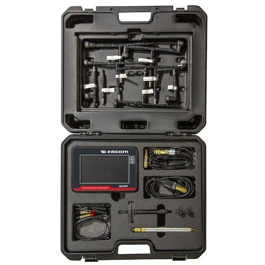 Facom 900_MPT automotive diagnostic tool kit with cables, connectors, and main display unit in black carrying case, top view.
