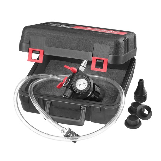 Facom 935A pressure tester kit with black case, gauge, transparent hose, and multiple adapters, front angle.