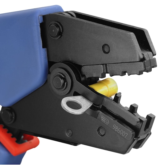 Facom crimping tool with blue handle, close-up side view, SKU 985753, clamping a yellow wire connector.