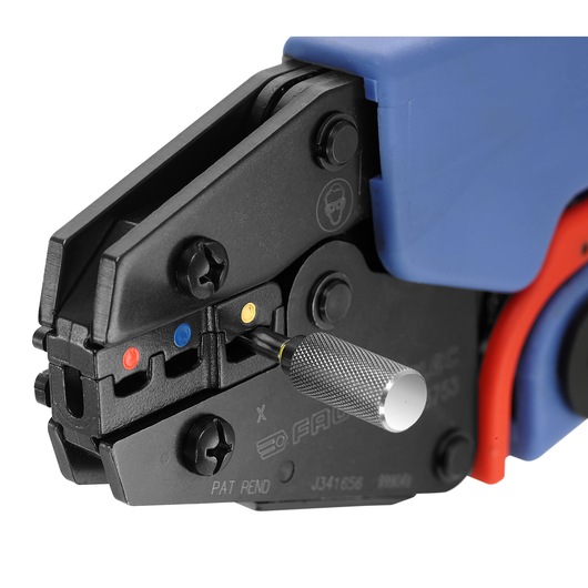 Facom crimping tool 985753 close-up, blue and black handle, adjustment knob, colored wire size markers.