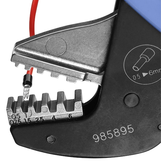 Facom wire crimping tool 985895 close-up, with red insulated terminal and marked jaw sizes.