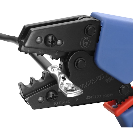 Facom 985966 crimping tool close-up with blue handle, black jaws, and terminal in tool, white background.