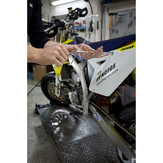 Facom 98B_12 T-handle hex key tool in use for motorcycle maintenance, garage setting.