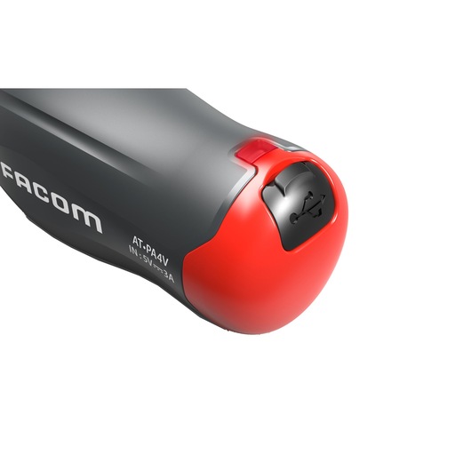 Photo of Facom AT_PA4V tool handle with visible USB charging port, black and red, close-up on white background.