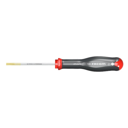Facom AT3_5X75 flathead screwdriver, black handle with red accents, side view on white background.