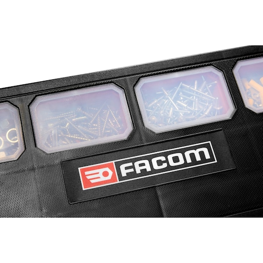Photo of Facom BP.P26APB organizer box lid with transparent compartments showing screws and hardware, top angle.