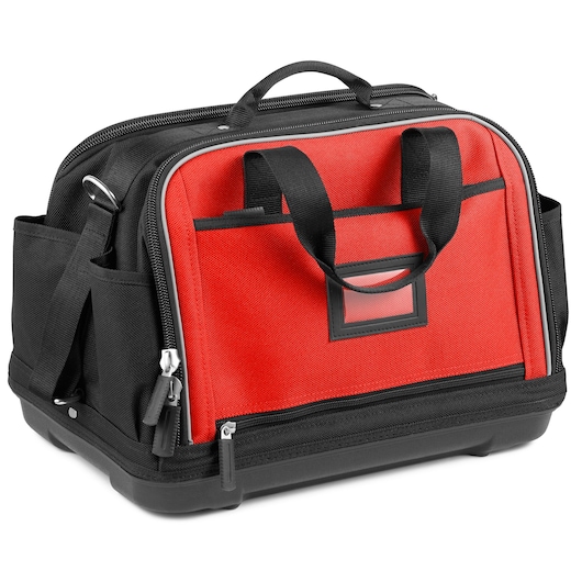 Facom BS.2SBPB tool bag with red front panel, black handles, side pockets, and zipper, angled view on white background.