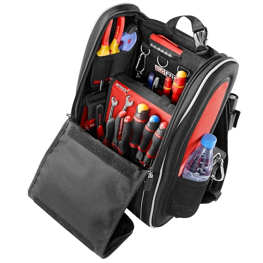 Facom BS.MCBPB tool backpack with open front displaying organized hand tools, water bottle in side pocket, front angle.