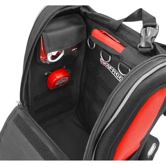 Photo of Facom BS.MCBPB tool backpack interior with red and black sections, tape measure, pockets, and tool loops.