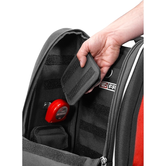 Facom BS.MCBPB backpack interior with hand opening Velcro pocket and red Facom tape measure.