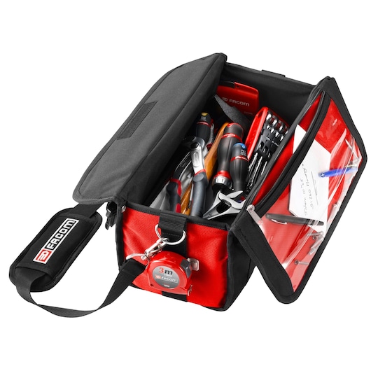 Facom BS.SMBPB red and black tool bag with shoulder strap, open top view showing assorted hand tools and a 3m tape measure.
