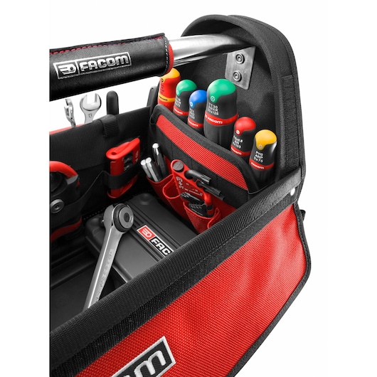 Facom BST14PB tool bag with assorted colored screwdrivers and wrenches, close-up angle.