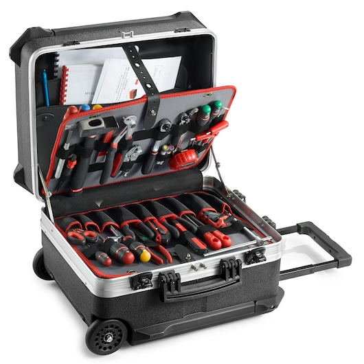 Facom BV61A rolling tool case with assorted hand tools and documents, front angle, white background