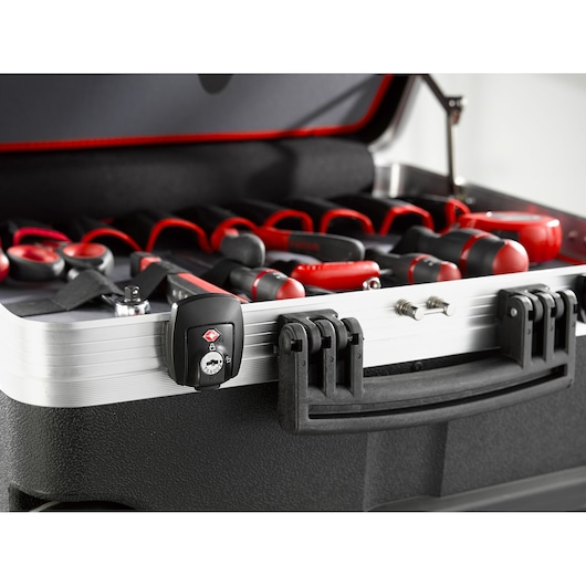 Facom BV61A tool case with open lid, showing multiple hand tools with red and black handles neatly organized.