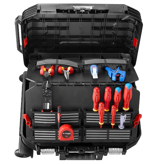 Photo of Facom BV_R30CM2PB tool case with organized hand tools, including screwdrivers, pliers, and tape measure, interior top view.