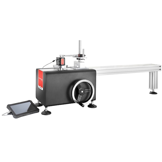 Facom CD12A calibration tool with large adjustment wheel, control display, and aluminum guide rail, side view.