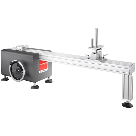 Facom CD12A torque calibration bench with metal frame, handwheel, and adjustable components, side angle, white background.