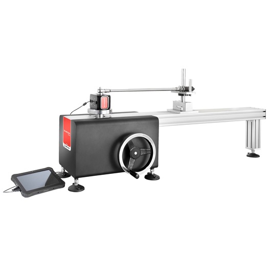 Facom CD12A precision calibration machine with touchscreen control, side angle, black and silver finish.