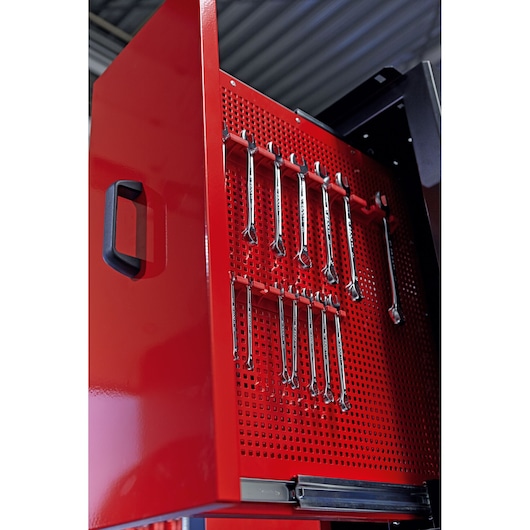 Facom CKS100 red tool cabinet side with wrenches on pegboard, angled view, photography product.