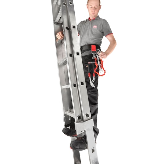 Facom CT70-100 photography of worker in grey shirt with safety harness and tools on aluminum ladder, front angle.