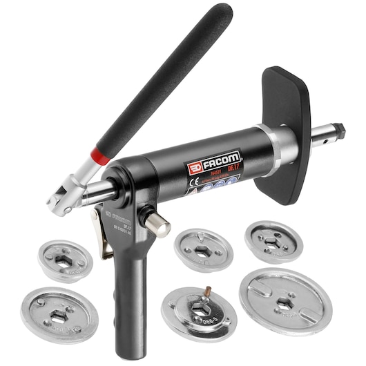 Facom DF17-100 manual hand crimping tool with black handle and metal accessories, angled on white background.